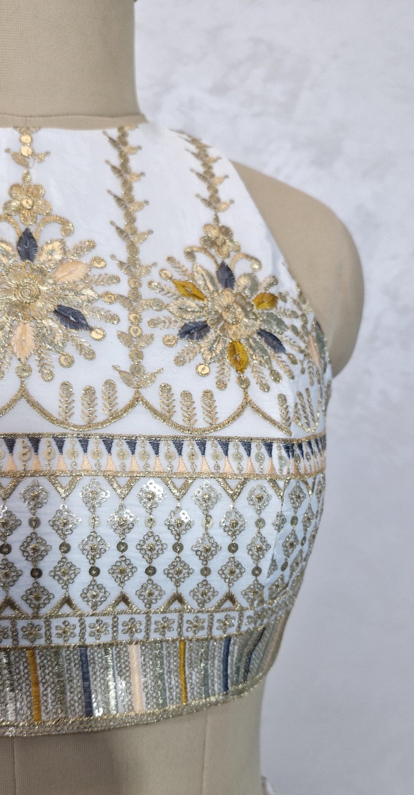 Ivory Embroidered Crepe Silk Halter Neck Blouse DVBL_445