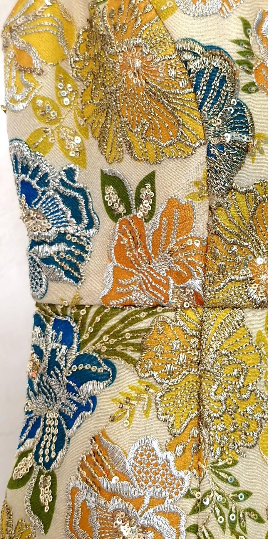 Multicolor Floral Embroidered Peplum Top DVBL_407