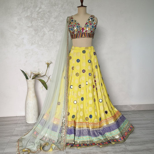Yellow Brocade Silk Lehenga Choli with Mirror Work DVMTD_0257