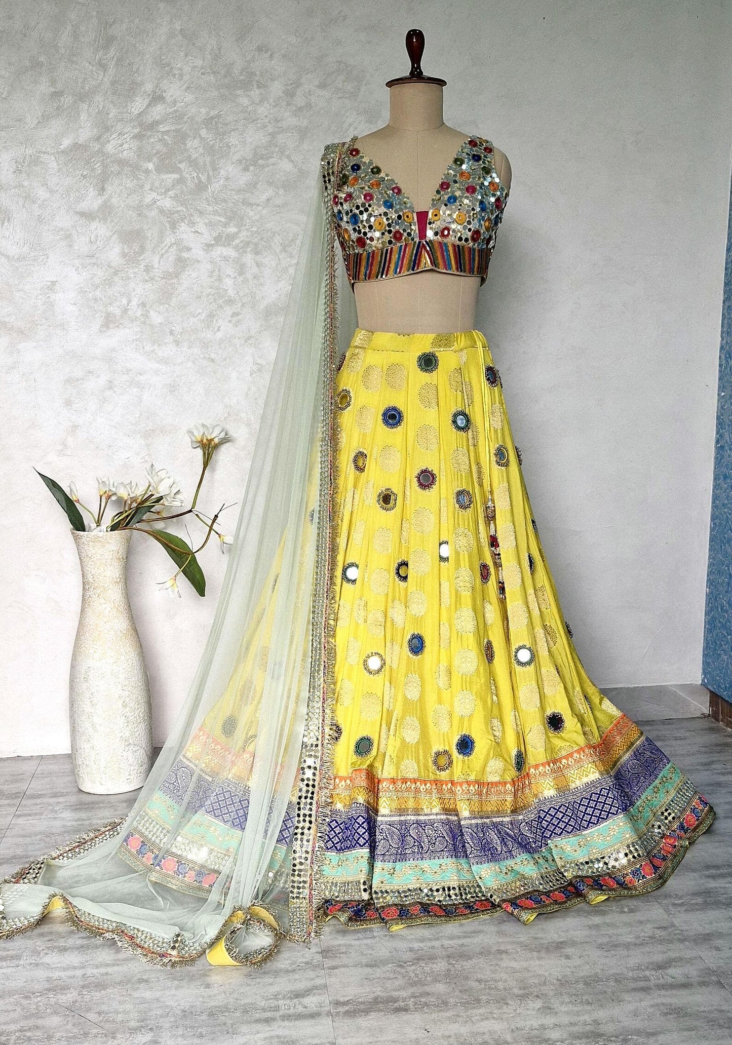 Yellow Brocade Silk Lehenga Choli with Mirror Work DVMTD_0257