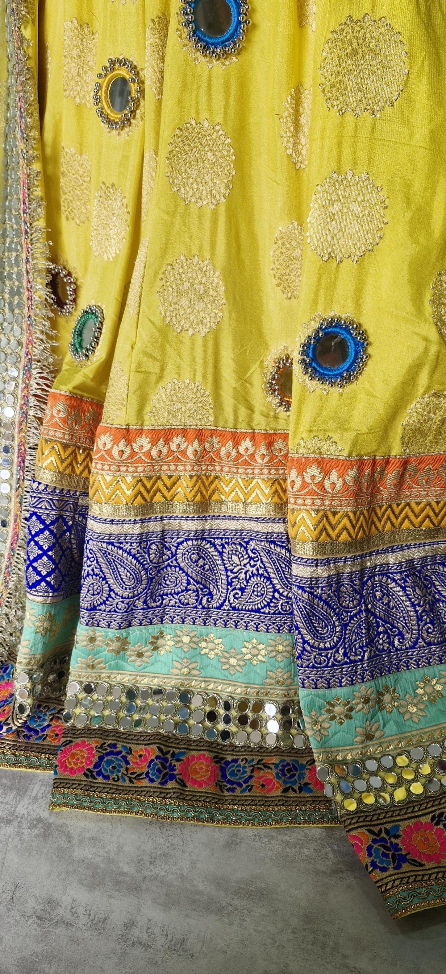 Yellow Brocade Silk Lehenga Choli with Mirror Work DVMTD_0257