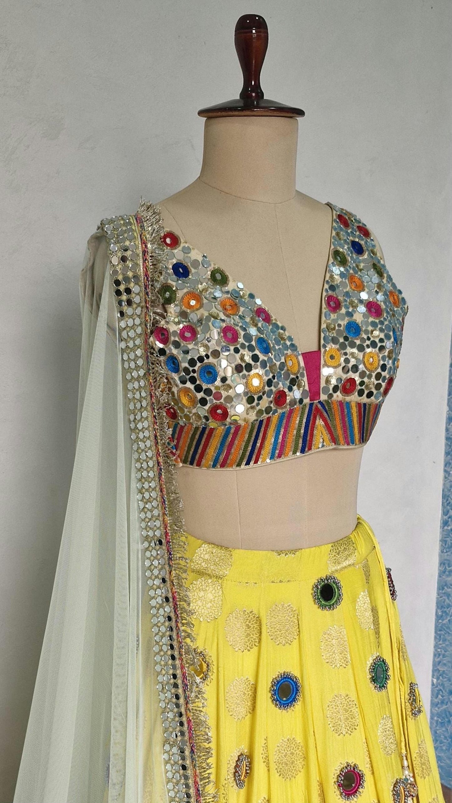 Yellow Brocade Silk Lehenga Choli with Mirror Work DVMTD_0257