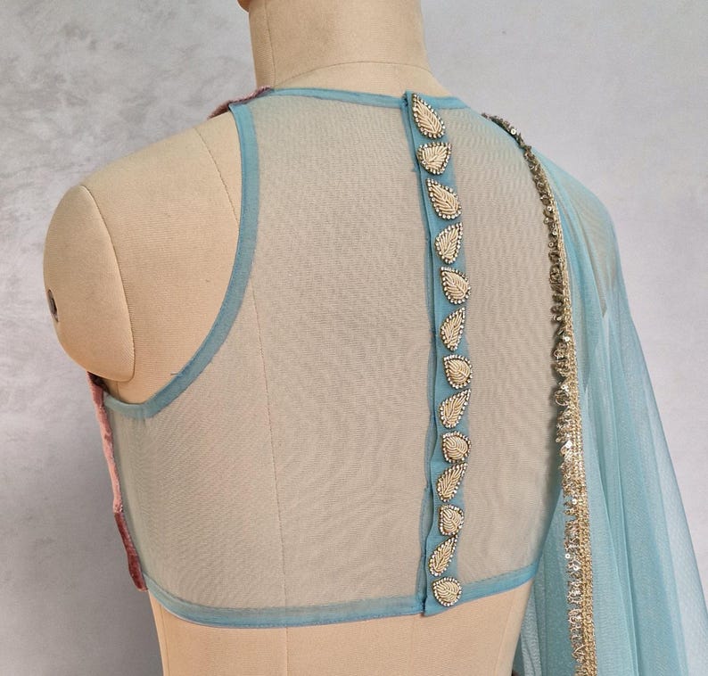 Mauve and Turquoise Embroidered Velvet Lehenga Choli DVMTD_0263