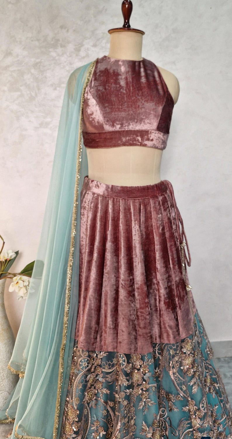 Mauve and Turquoise Embroidered Velvet Lehenga Choli DVMTD_0263