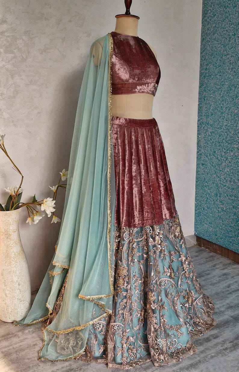 Mauve and Turquoise Embroidered Velvet Lehenga Choli DVMTD_0263