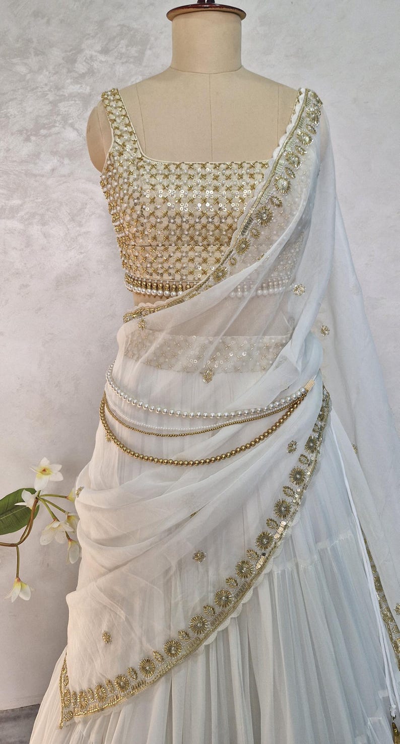 Off white Georgette Tiered Lehenga Choli DVMTD_0264