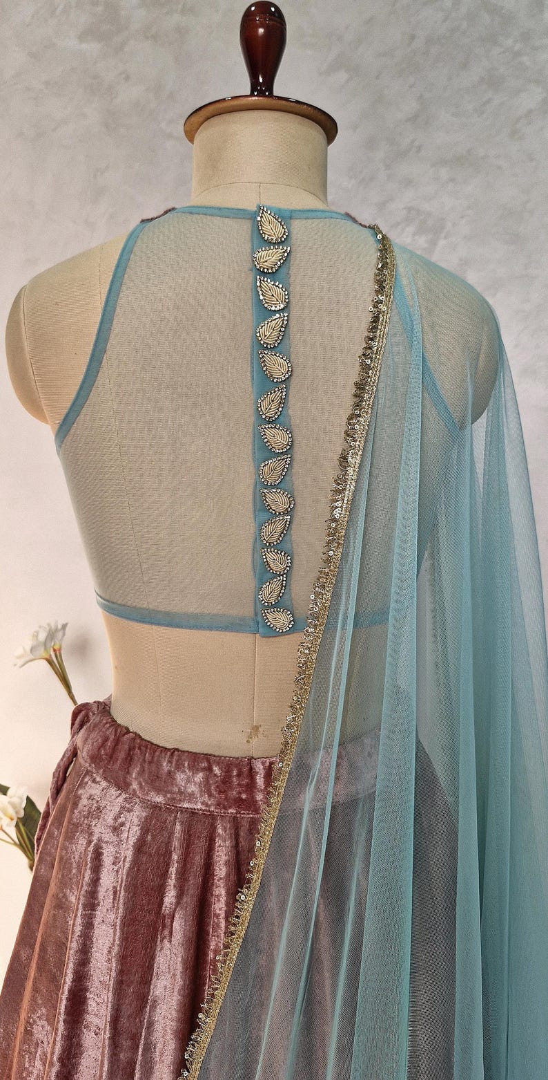 Mauve and Turquoise Embroidered Velvet Lehenga Choli DVMTD_0263