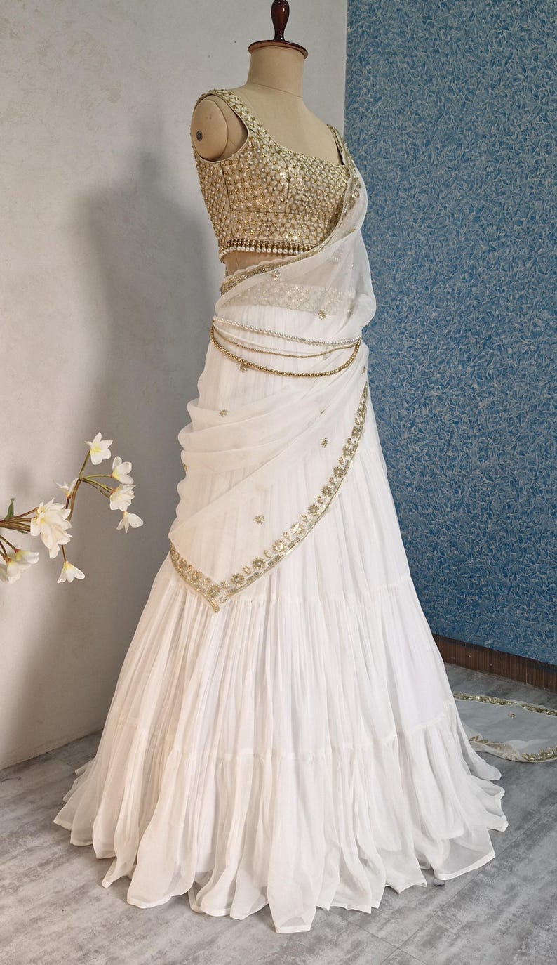 Off white Georgette Tiered Lehenga Choli DVMTD_0264