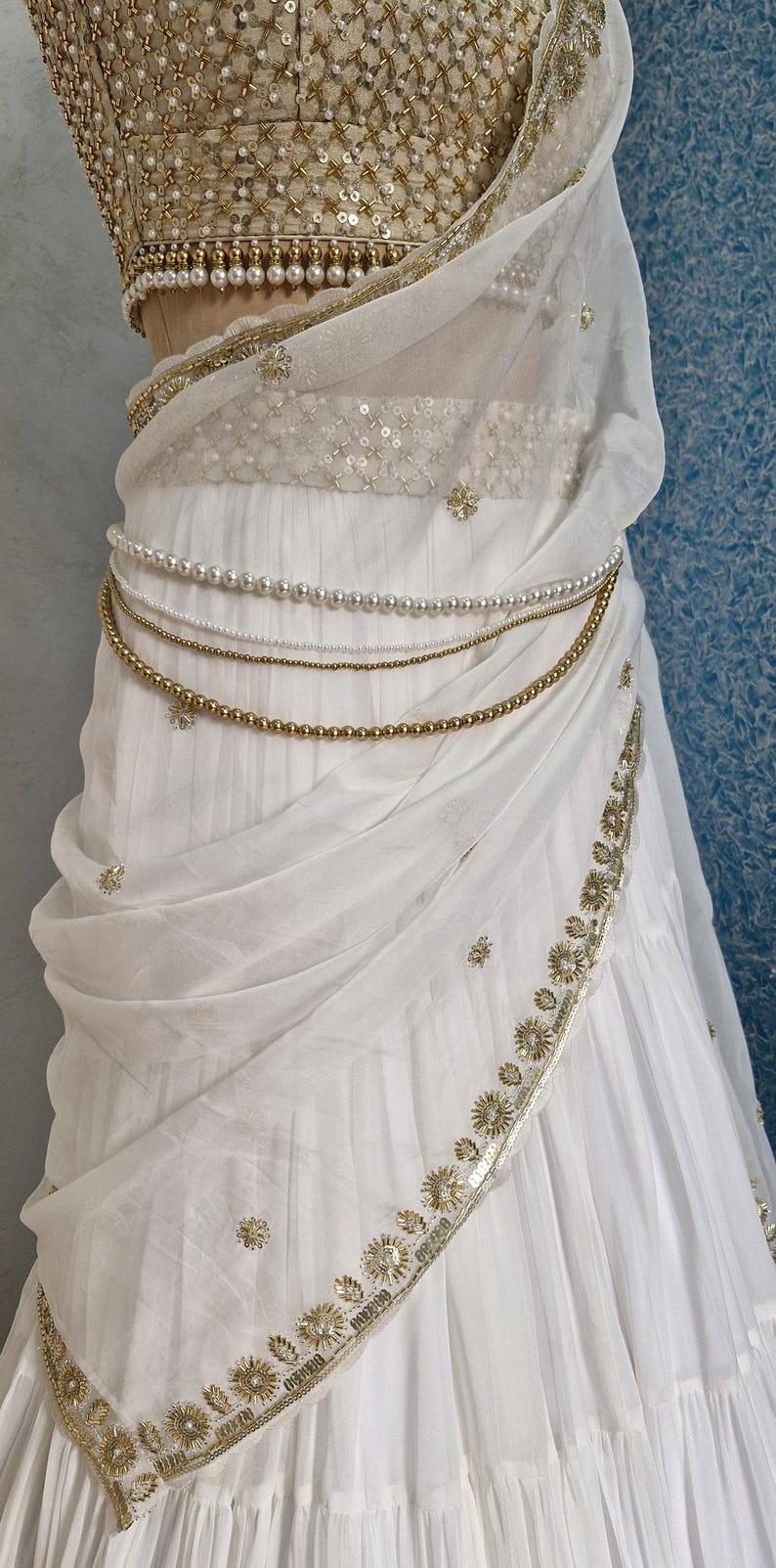 Off white Georgette Tiered Lehenga Choli DVMTD_0264