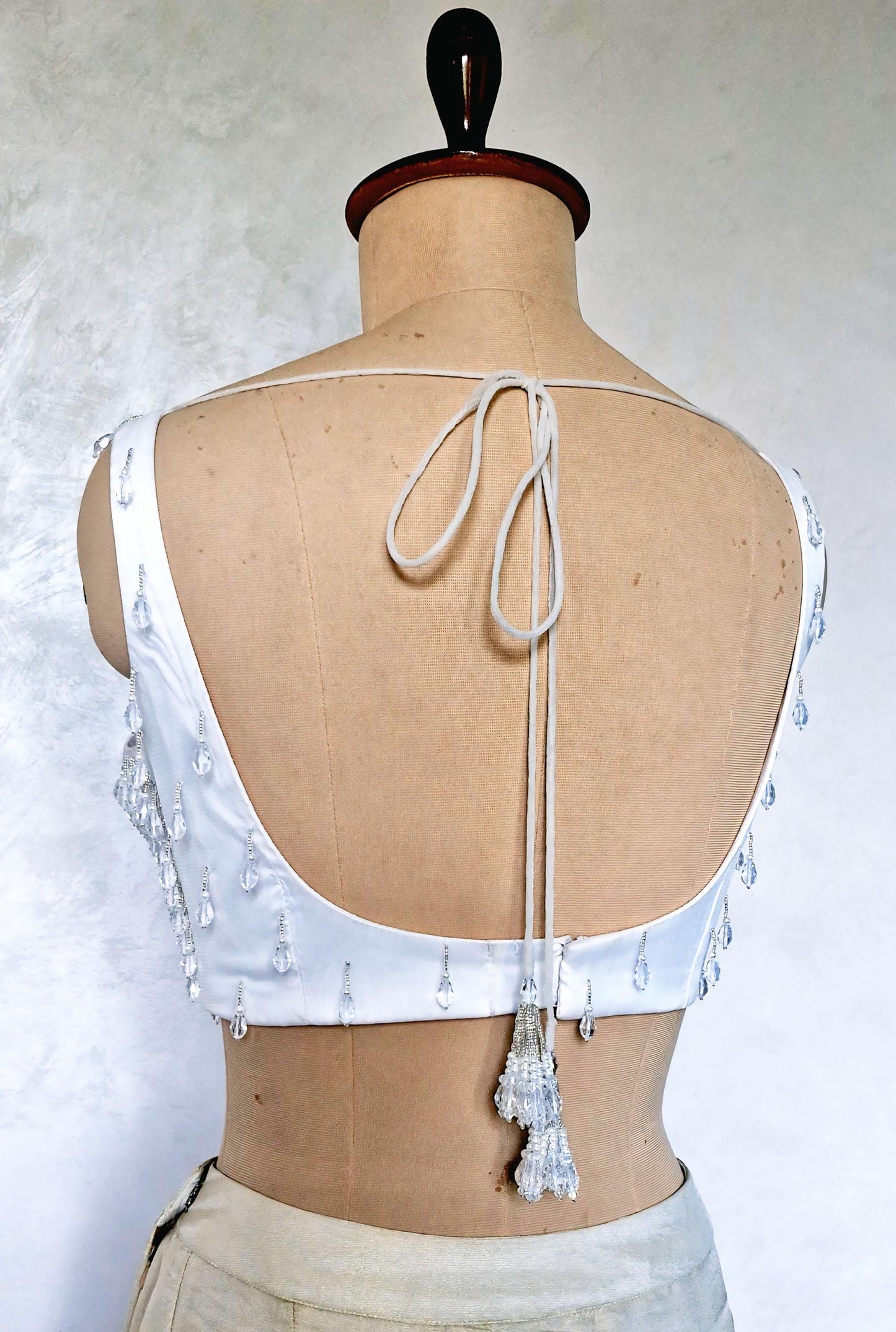 Hand Embroidered White Blouse, Hanging Beads Embellishment, Deep Sweetheart Neck DVBL_486